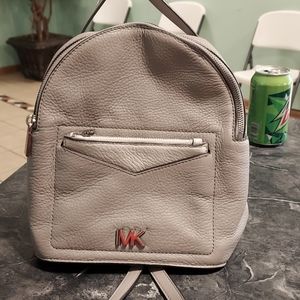 Sm backpack or cross mk purse